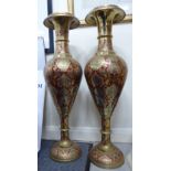A pair of modern Asian inspired brass pedestal vases,