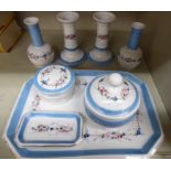 A late Victorian china eight piece dressing table set: to include a rectangular tray with flora,