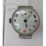 A lady's 'antique' round silver cased wristwatch,