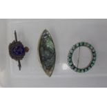 Three dissimilar brooches,