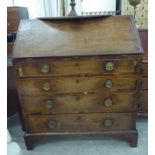 A Georgian mahogany bureau, the fall front enclosing a fitted interior,