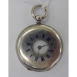 A lady's silver coloured metal cased half-hunter pocket watch with engraved Roman numerals around