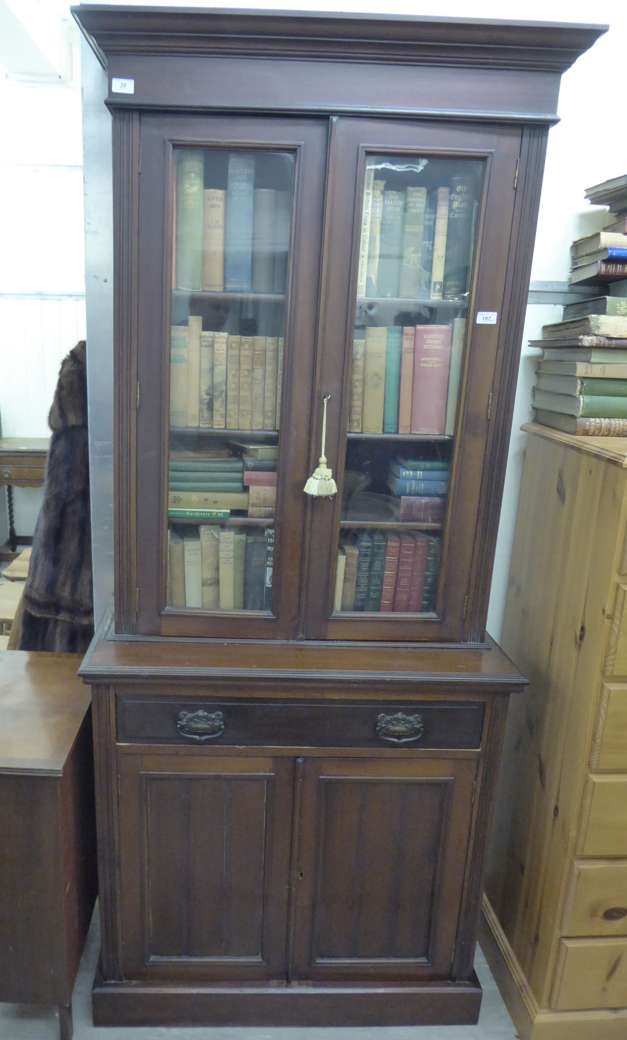 A late Victorian mahogany cabinet bookcase,