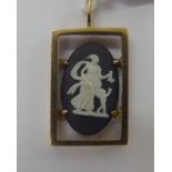 A 9ct gold framed pendant,