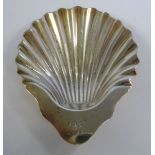 A late Victorian silver scallop shell design butter dish,
