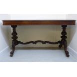 A William IV rosewood library table, the top with a thumb moulded edge and round corners,