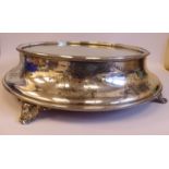 An early 20thC silver plated cakestand of curved bead bordered design,