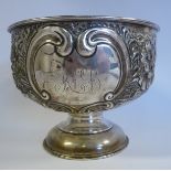 An Edwardian silver rose bowl, on a domed pedestal foot,