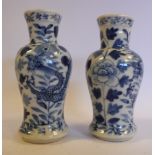 A pair of late 19thC Chinese porcelain vases of waisted baluster form with wide, flared necks,