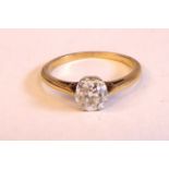 A yellow metal diamond solitaire ring,