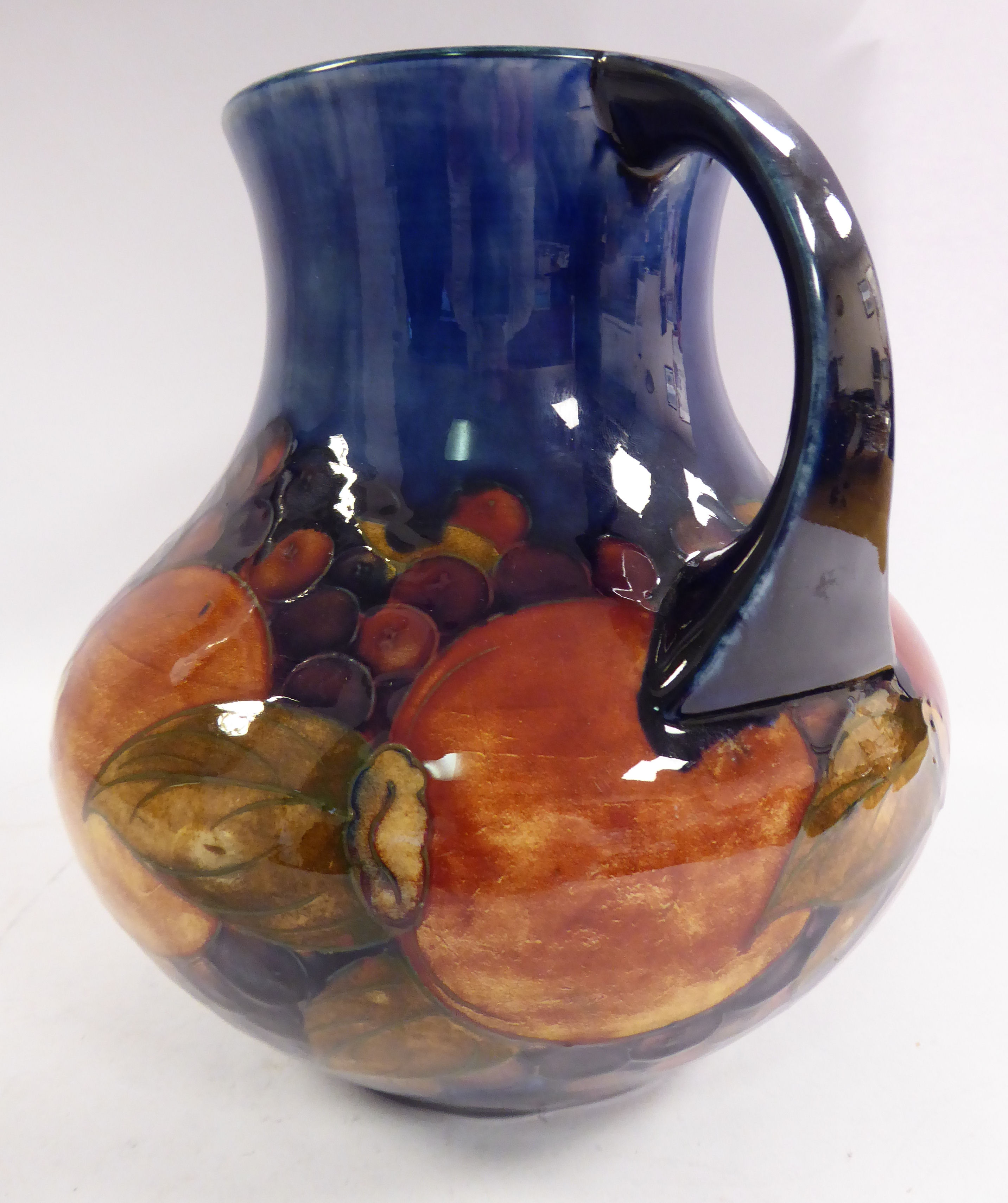 A Moorcroft pottery vase of squat, bulbous form, having a wide, - Image 3 of 6