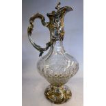 A Victorian style cut crystal wine ewer of bulbous form with an applied,