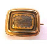 An 18ct gold rectangular mourning brooch,