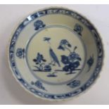 A mid 18thC Chinese porcelain footed dish with angled sides, decorated with a bird,