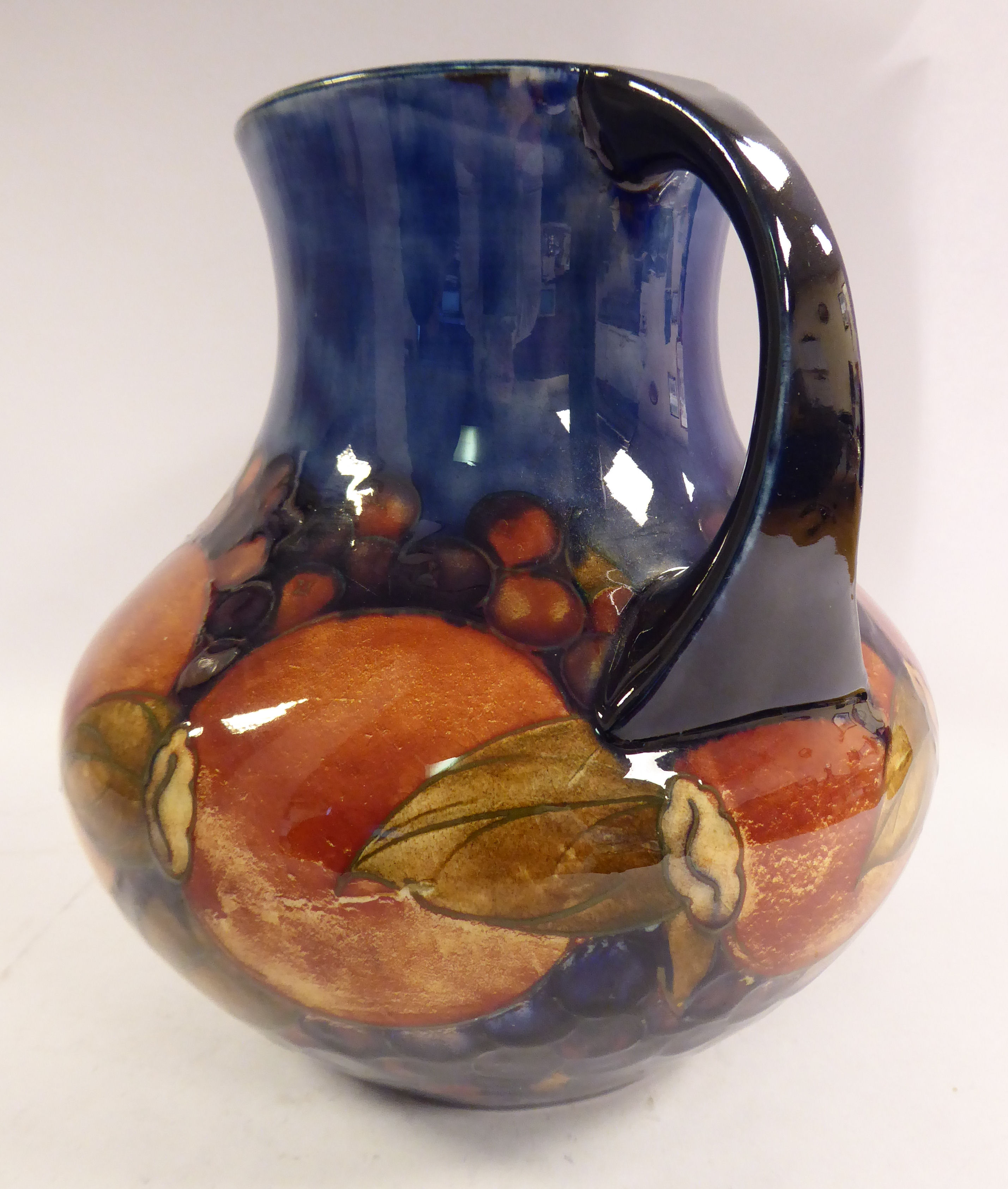 A Moorcroft pottery vase of squat, bulbous form, having a wide, - Image 2 of 6