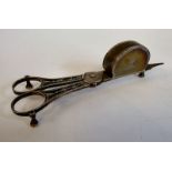 A pair of George III silver scissor action candle snuffers/wick trimmers with bead bordered and