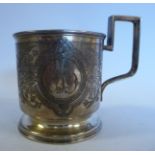 A 20thC Russian silver cup of straight sided form, on a splayed footrim, having an angular,