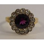 An 'antique' gold rubellite and diamond cluster ring