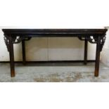 A 20thC Chinese stained and lacquered table, the panelled and mitred top, over a straight,