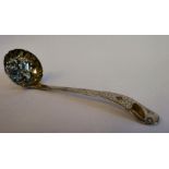 A George III silver sifter spoon with a circular bowl,