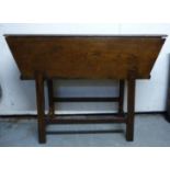 An early 19thC boarded ash dough bin of traditional tapered form with a cover and divided interior,