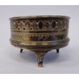 A George III silver coaster with decoratively and uniformly pierced and engraved straight sides,