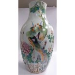 An early 20thC Chinese porcelain baluster shaped vase, having a wide, tapered neck,