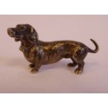 A cast silver model, a miniature standing Dachshund stamped 925 1.25''h 2.