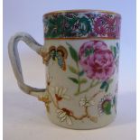 A late 18thC Chinese porcelain cylindrical mug with an entwined twig handle,