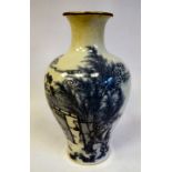 An 18thC Chinese porcelain vase of waisted baluster form with a narrow neck and flared rim,