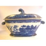 An early 19thC Pearlware tureen of oval form with scrolled handles and a knop to the cover,