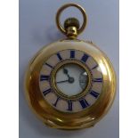 An early 20thC ladies 18thC gold cased half hunter pocket watch with a tinted pink and blue