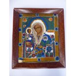 A 19thC Russian icon, painted on a wooden panel, featuring a classic study of the Madonna and Child,