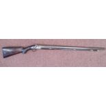 A 19thC percussion action 12 bore shotgun