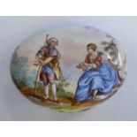 An early 19thC painted enamel oval trinket box, decorated with figures in gardens and landscapes,