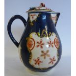 A late 18thC Worcester china jug of bulbous sparrow beak form with a loop handle and cover,