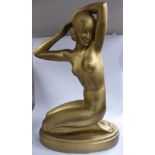 Kovats - an early Art Deco inspired gilded plaster study, a kneeling nude,