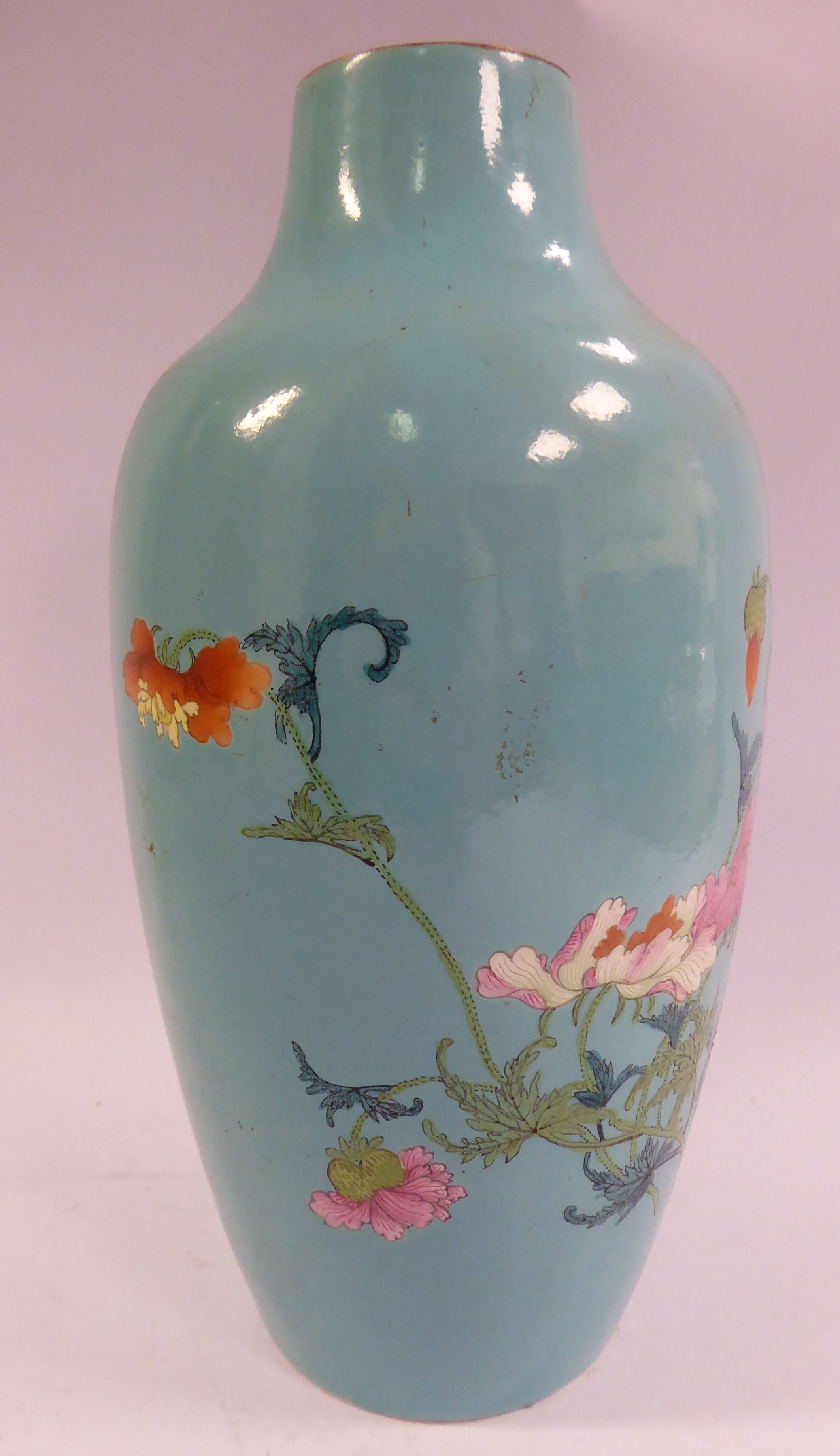 An 18thC Chinese turquoise glazed porcelain vase of baluster form, having a tapered neck,