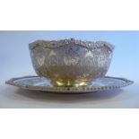 A Middle Eastern/Asian silver coloured metal wavy edged bowl 5''dia and matching plate with