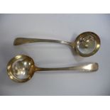 A pair of George III silver sauce ladles with circular bowls,