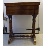 A late 19th/early 20thC satin mahogany work table with a rising tray top,