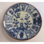 A mid 18thC Chinese Kraak design porcelain dish, decorated in blue and white with flora,