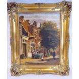 J Beckhart - a 19thC Dutch street scene with figures oil on board bears a signature 13.