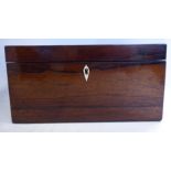 A Regency rosewood tea casket with straight sides and a lockable, flat-topped, hinged lid,