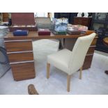 A modern hardwood veneered office desk,