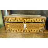 A late 19thC walnut writing box with straight sides and an angled, lockable, hinged lid,