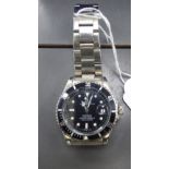 A replica Rolex Perpetual Date Submariner stainless steel cased bracelet wristwatch CS
