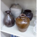 Four dissimilar 'antique' Oriental pottery/stoneware vases: to include one of tapered,