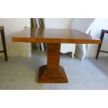 A modern burr walnut laminated table,