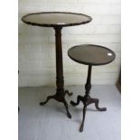 An early 20thC Georgian inspired pedestal table with a piecrust top, over a turned column,